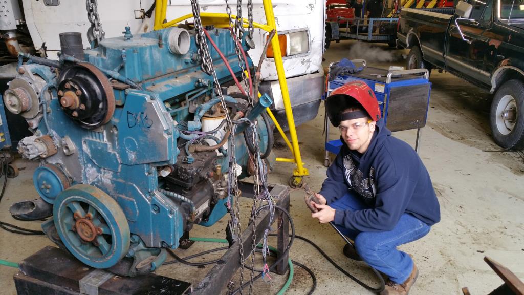 Student working on an engine in diesel.