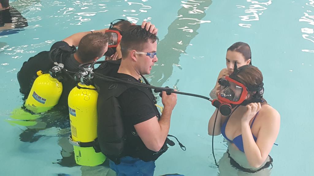 Criminal justice students working with the local dive team.