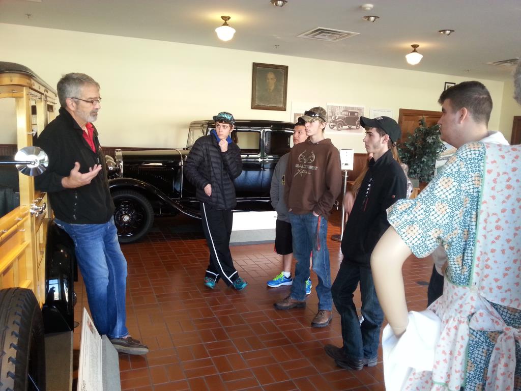 Auto students tour the Gilmore Car Museum.