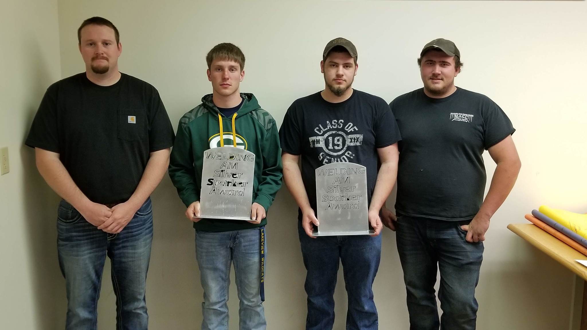Mr. Deal, Mr. Daggett, and students that earned special honors in welding.