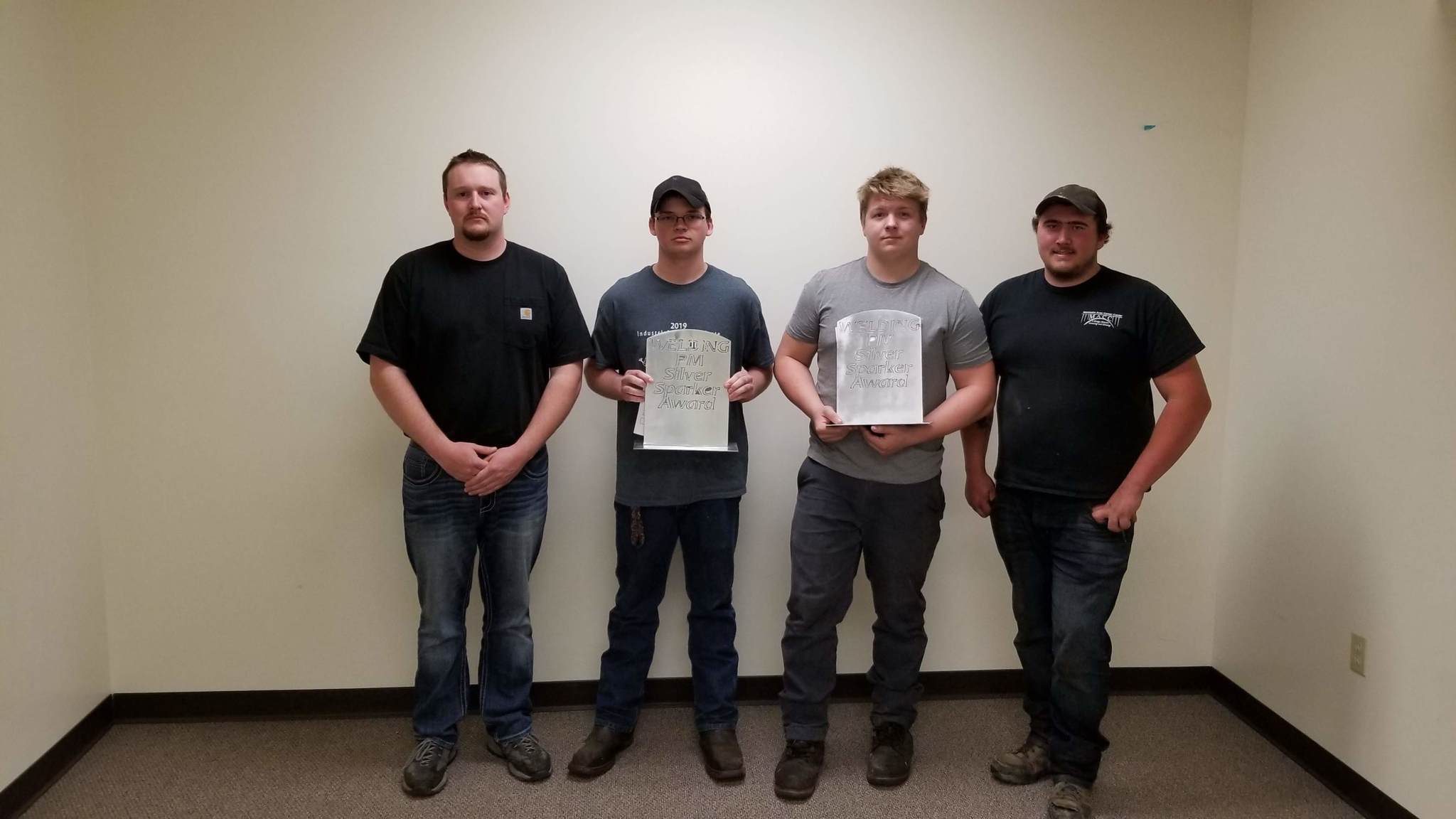 Mr. Deal, Mr. Daggett, and students that earned special honors in welding.