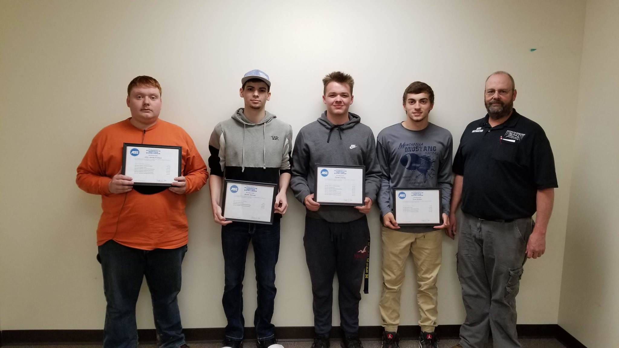 Mr. Scheese and students that earned ASE entry-level certifications.
