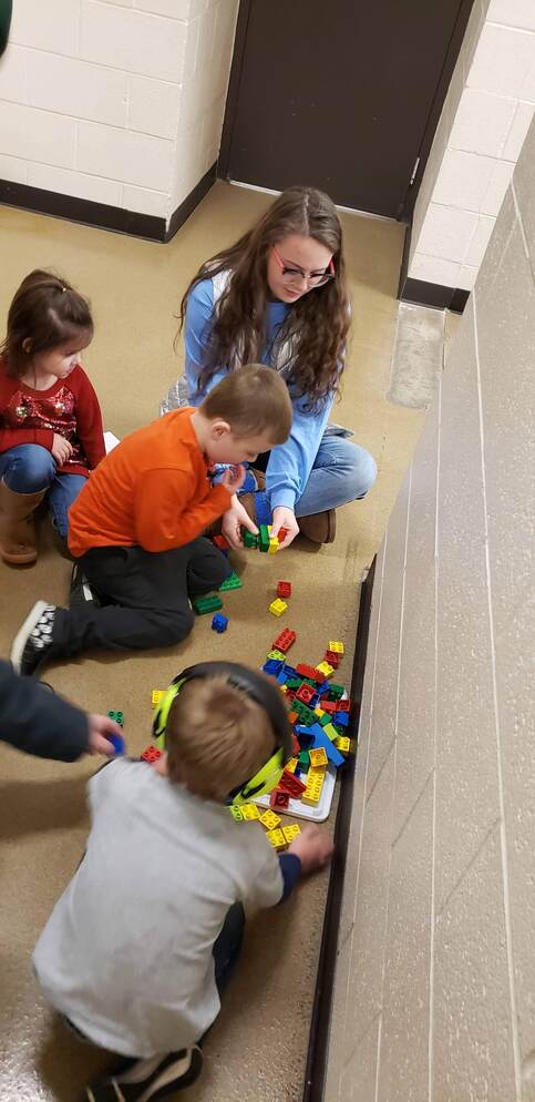 Educational Careers students working with preschool students.