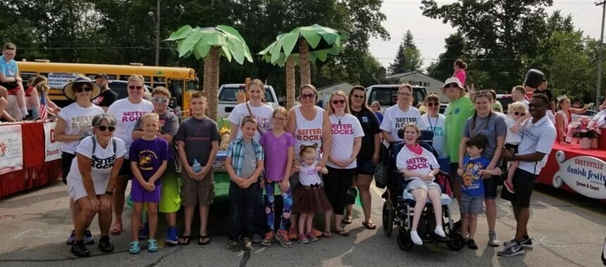 Picture of students and staff from the Seiter Education Center getting ready for the Danish Festival parade.