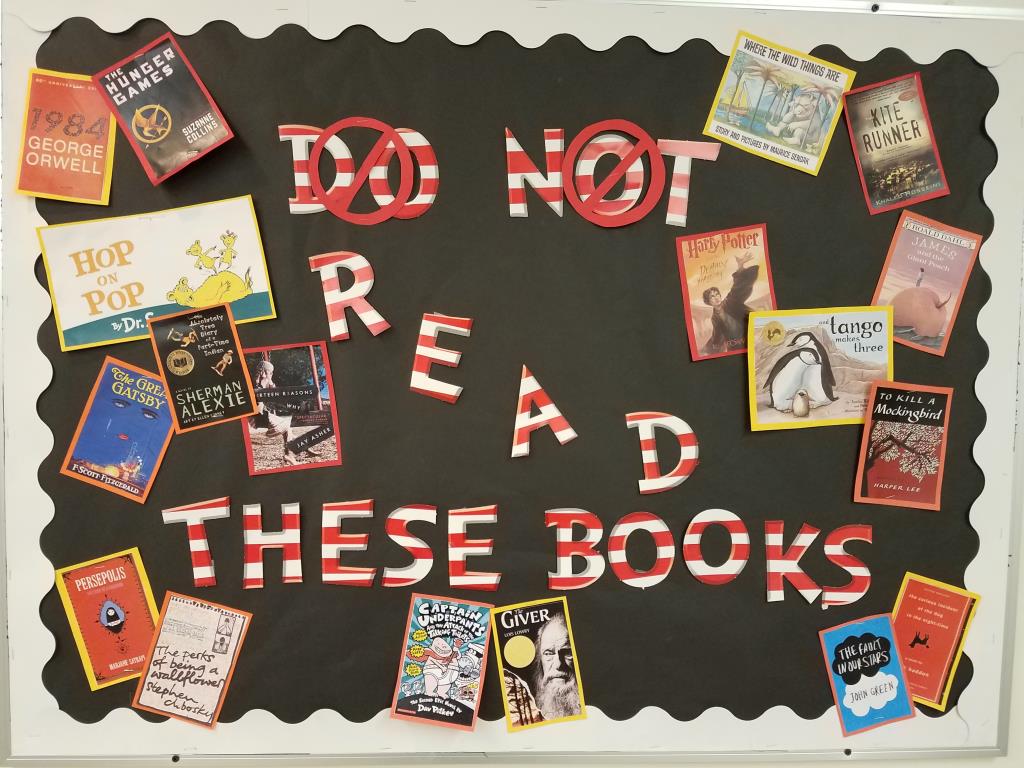 A picture of a bulletin board in English Class regarding banned books.