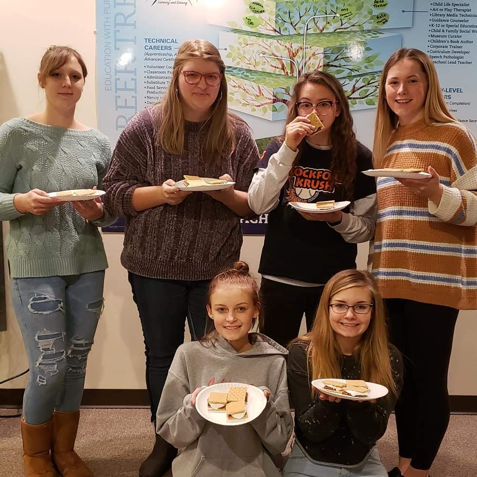 The Educational Careers class enjoying smores after their lesson on Blooms Taxonomy.