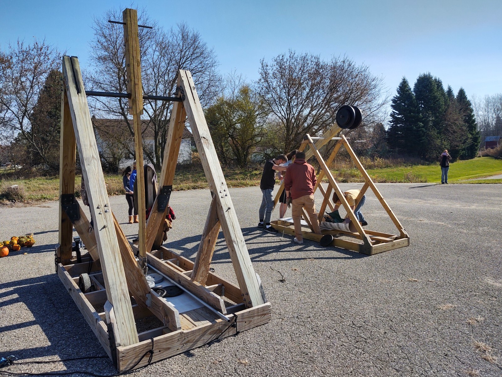 CAD students working with the trebuchet.