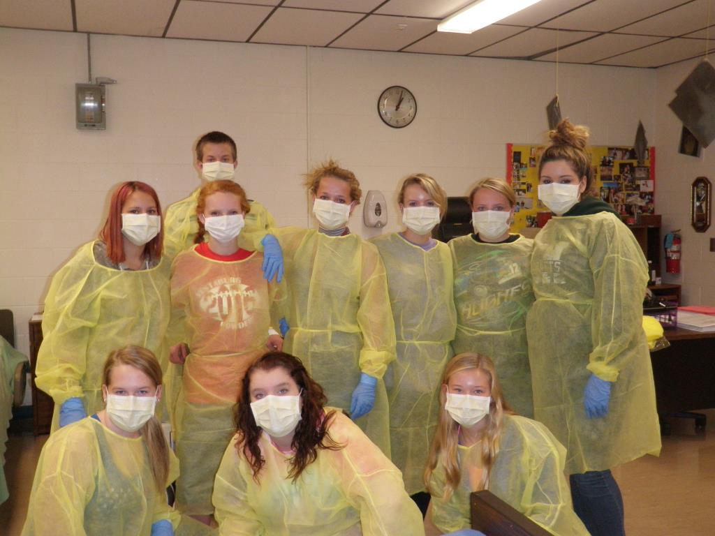 Health class suited up in personal protective equipment.
