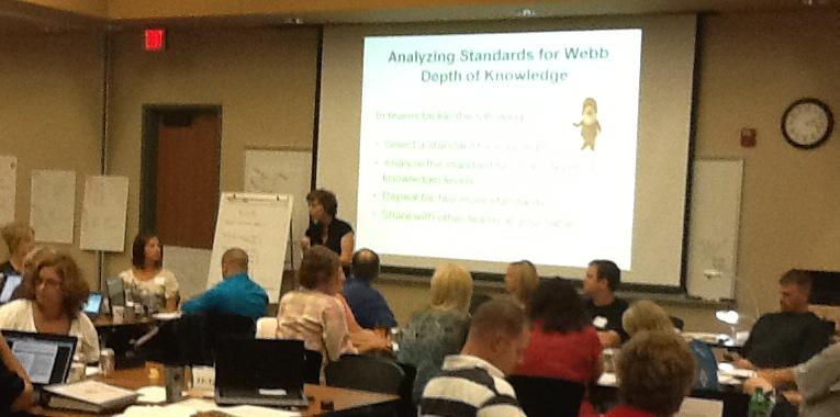 National curriculum consultant Karen Bailey explains Webb's Depth of Knowledge to teachers during a workshop on the Common Core State Standards.