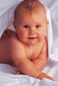 Baby laying down in a blanket