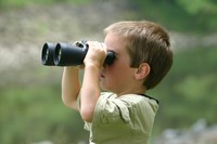 Boy with binoculars